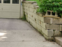 a failing retaining wall around a driveway in Toronto