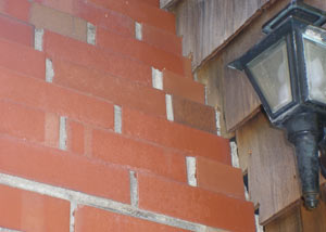 a repaired chimney in Ajax that had shown serious foundation damage and was repaired with a helical pier system.