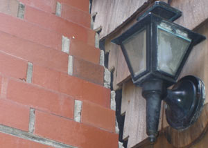 A tilting chimney in Ajax showing serious foundation damage.