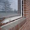 A gap in a window along the outer wall due to foundation settlement of a Whitby home.