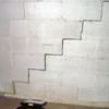 A diagonal stair step crack along the foundation wall of a Pickering home