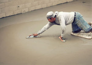 smoothing out the grout in a slab releveling project in Richmond Hill
