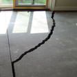 a huge crack in a concrete slab floor in Brampton
