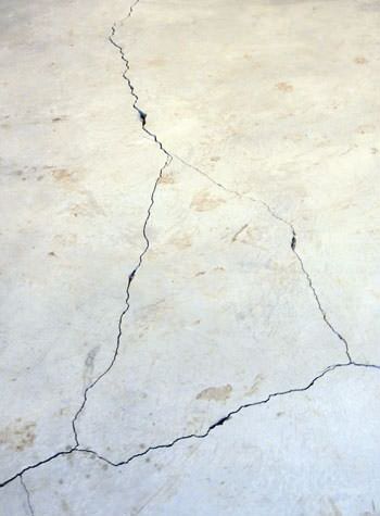 severely cracked, heaving slab floors in a home in Georgina
