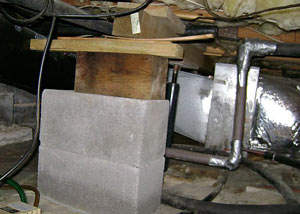 a poorly designed crawl space support system installed in a Guelph home