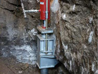 Foundation repair contractors lifting a structure in Mississauga.