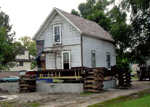 A severely damaged home foundation that is undergoing replacement in Aurora.