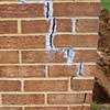 Tuckpointing that cracked due to foundation settlement of a Mississauga home