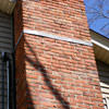 A tilting chimney on a Bradford West Gwillimbury home with a leaning, tilting chimney that was temporarily repaired.