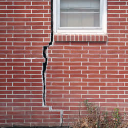 A foundation with a large crack that's wider at the top than on the bottom in Orillia