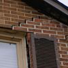 Stair step cracking starting at a window in a Caledon home