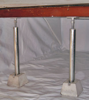 Crawl space jack posts installed in conjunction with a crawl space vapor barrier in Orillia