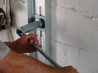 Mounting a foundation wall channel anchor in Richmond Hill.
