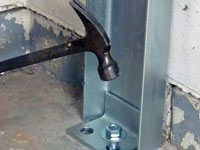 Mounting a foundation channel anchor installation to the floor in Richmond Hill.