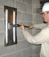 Tightening a wall anchor plate in Markham, Ontario