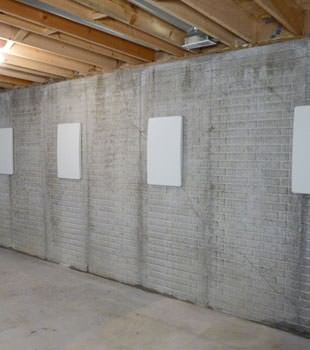 Wall anchor covers covering a foundation wall repair system in Barrie, St. Catharines, Owen Sound, Whitby, Guelph, Ajax, Pickering