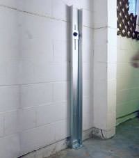 A failing foundation wall repaired with a foundation wall channel anchor system in a Markham home.