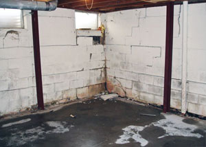 A failed, rusty i-beam foundation wall system installed in Orillia.