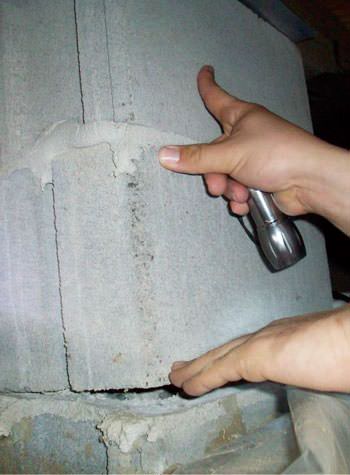 a completely failing concrete crawl space support pillar in Innisfil