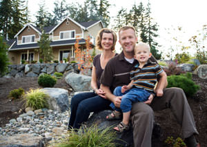 A happy family outside a home with a repaired foundation in Georgina